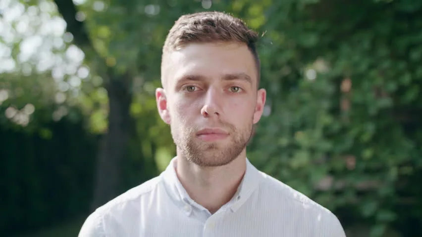 Portrait of a man wearing a light shirt